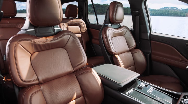 The front row's Perfect Position Seats in a 2024 Lincoln Aviator® Reserve model with Ebony Roast interior | Wallace Lincoln in Fort Pierce FL