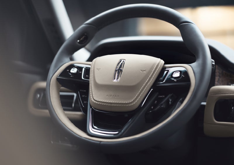 The intuitively placed controls of the steering wheel on a 2024 Lincoln Aviator® SUV | Wallace Lincoln in Fort Pierce FL