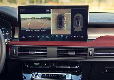The driver of a 2024 Lincoln Corsair® SUV is shown selecting the drive mode. | Wallace Lincoln in Fort Pierce FL