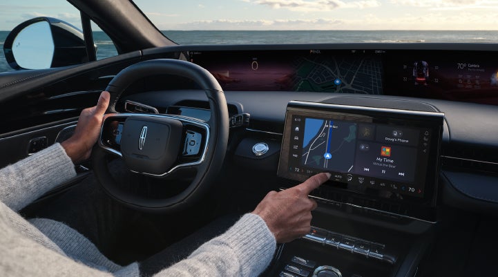 The driver of a 2024 Lincoln Nautilus® SUV interacts with the new Lincoln Digital Experience. | Wallace Lincoln in Fort Pierce FL